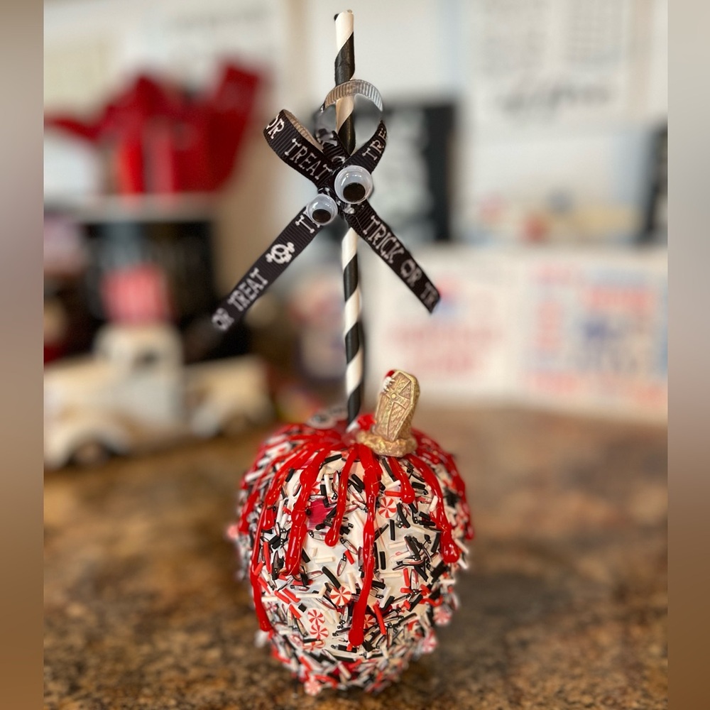 Festive Halloween Candy Apple with Red and Black Accents